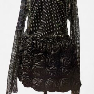 Black rose ruffle skirt
New with tags!